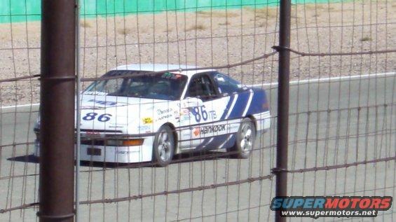 cimg0047.jpg On the front straight chasing the 944