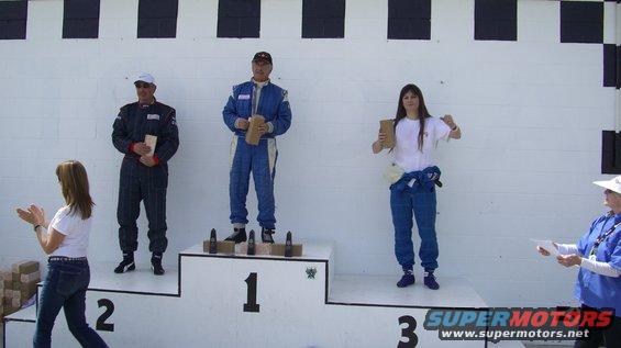 Standing on the Podium again after a wild incident involving a fuel can.
