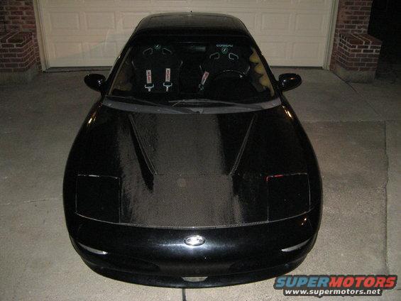 Black 1995 Ford Probe front view, carbon fiber hood, racing seats visible