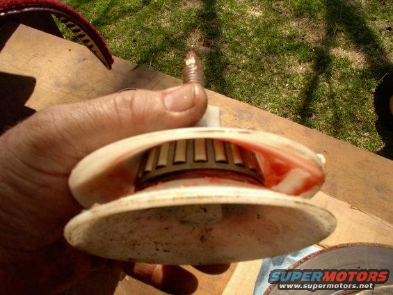 Load the bearing packer and apply the grease gun to really load those bearings with synthetic grease.