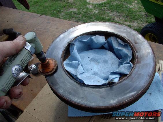 As rusty as my rotor looked (it's a salt-belt thing) it had no serrations or heat scoring and plenty of thickness left. So a little scuffing with an abrasive pad will help bed the new pads into the rotor surface.