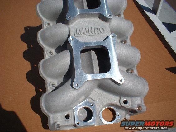 Close-up of a Munro intake manifold with two carburetor mounting plates