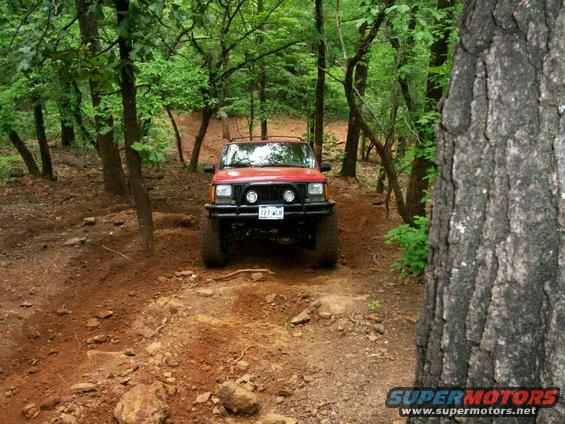 Crazy Dave's XJ going up loose-dirt hill climb on J.P.'s Expwy