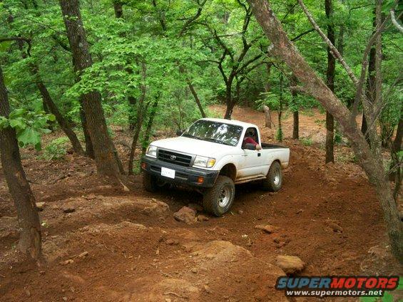 Boricua Ben going up loose-dirt hill climb on J.P.'s Expwy