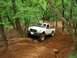 Boricua Ben going up loose-dirt hill climb on J.P.'s Expwy