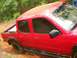 Chris's D-Cab gettin' close to wall and tree root on right-side hill climb of J.P.'s Expwy
