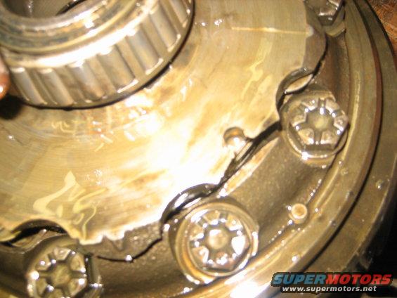 Close-up of broken gear teeth inside a differential housing