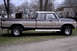 1979 Ford Bronco - This Ford F-Series pickup truck features a two-tone paint scheme and a crew cab configuration.