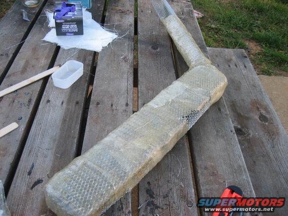 img_1986.jpg The fiberglass is kinda hard to work with. Definitely do not work on this in direct sunlight, there is supposed to be a workable time of 15 minutes or so, since it was hot outside, the longest I could get was around 5 mins in the shade, and like 1 in the sun. and I couldn't do this inside, - way too messy and very stong fumes