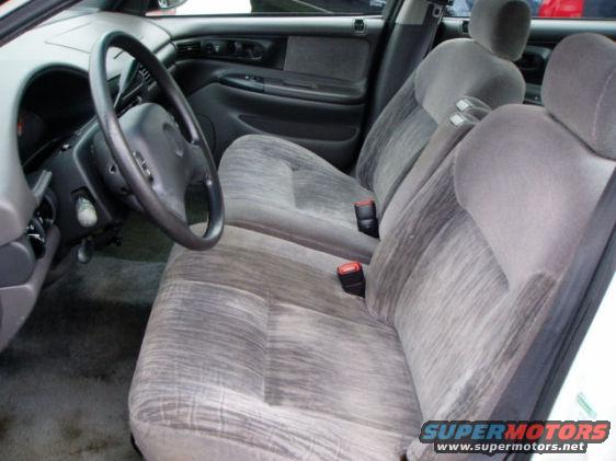 frontseat.jpg Picture of identical car, front seat. (Our cupholders are missing though)