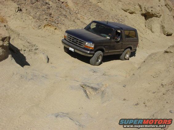 1994 Ford Bronco on a rocky dirt trail