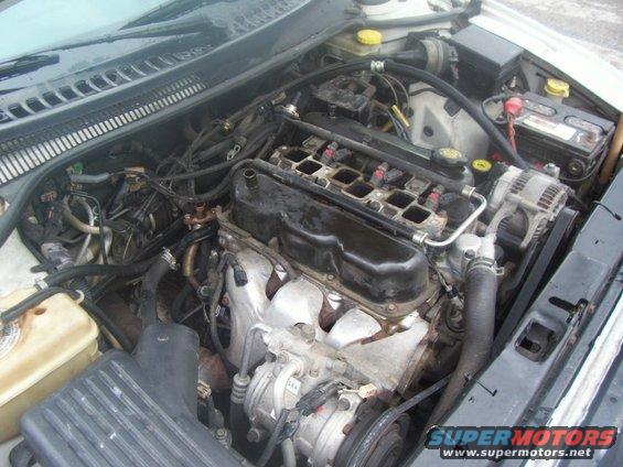 100_0543.jpg Another closer right side view of engine compartment, plenum, TB, intake hose removed.