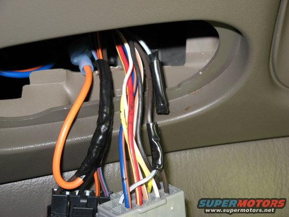 Another view of the wire splice.  The fog circuit used to receive power from the white w/black stripe wire.  Now the switch gets its power from the parking light output (brown wire).  No worries about drawing to much current, the fog switch controls the factory relay, not the lights directly.