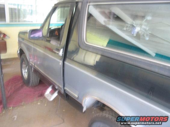 Side view of a 1992 Ford Bronco parked indoors