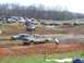 2001 Dodge 1500 - A mud race event with multiple trucks competing in the dirt track.