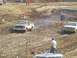 2001 Dodge 1500 - Pickup trucks compete in a mud race event on a challenging off-road course.