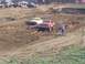 2001 Dodge 1500 - Multiple trucks compete in a mud race event on a challenging dirt track.