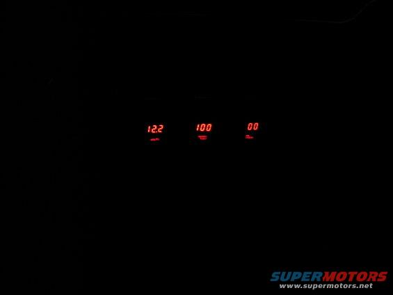 Three red digital gauges showing 12.2, 100, and 00