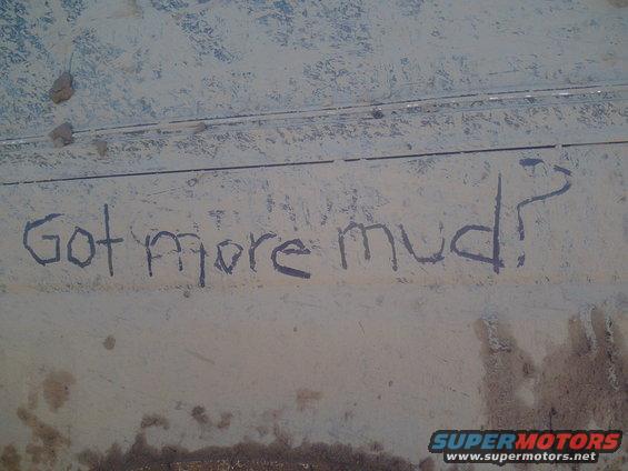 Muddy vehicle side with "Got more mud?" written on it