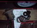 1984 Ford Bronco - A collection of differential gears and components are laid out on a surface with a handwritten label.