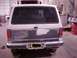 1990 Ford Bronco II - The rear of a Ford Bronco II is visible in a workshop setting.