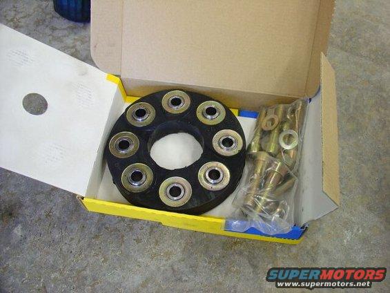 Driveshaft flex disc and hardware kit in an open box