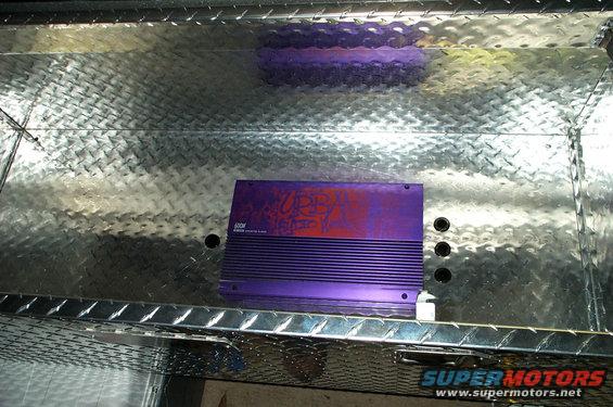 Purple amplifier with graffiti in diamond plate toolbox