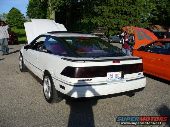 White 1991 Ford Probe rear view, hood open