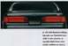 1995 Ford Thunderbird - Rear view of a 1994 Ford Thunderbird, highlighting its full-width illuminated taillamps.