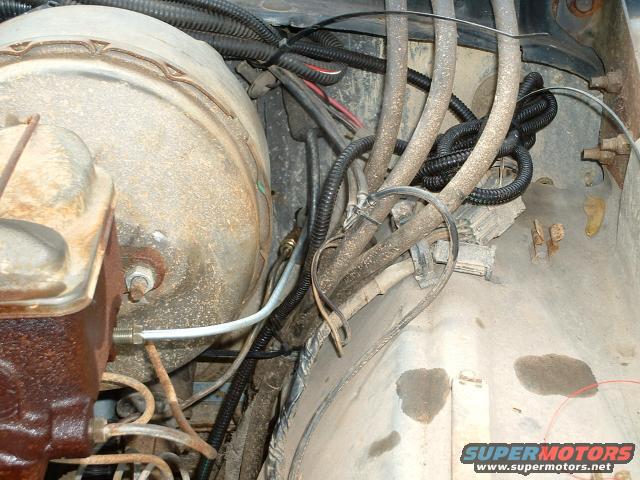 Engine bay brake booster and master cylinder with wiring and hoses