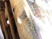 1992 Ford F-350 - Close-up of a rusty chrome bumper, showing wear and tear.