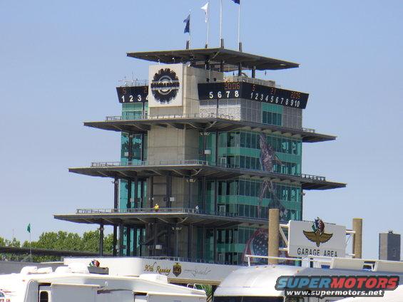 Indianapolis Motor Speedway pagoda with scoreboard and '90th Racing' text