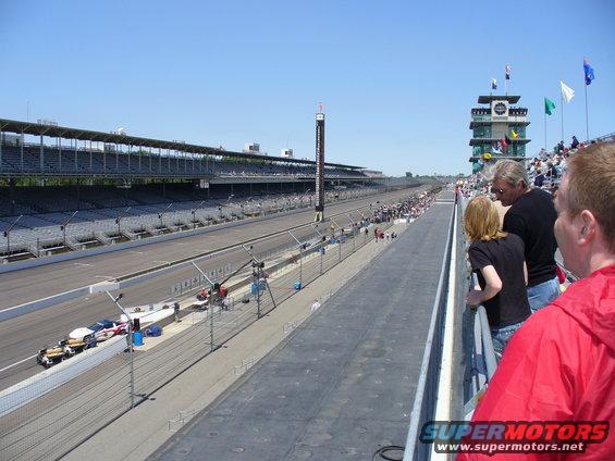 Indianapolis Motor Speedway race track with empty grandstands and a control tower