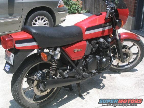 Red motorcycle side view with GPz 550 badging and black seat