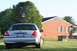 2004 Ford Crown Victoria - Rear view of a silver Ford Crown Victoria parked on a grassy lawn.