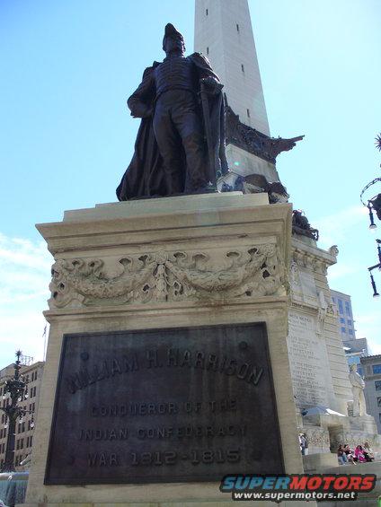 Statue of William H. Harrison on monument with inscription