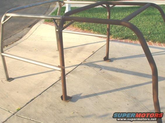 Roll cage tubing sections on concrete driveway
