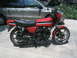 1981 Kawasaki Bayou - Red 1981 Kawasaki GPz 550 motorcycle with silver and black stripes on the tank.