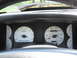 1967 Ford Mustang - Interior view of a car's dashboard, showing various gauges and an odometer reading.