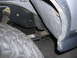 1988 Ford Bronco - Vehicle leaf spring and tire detail.