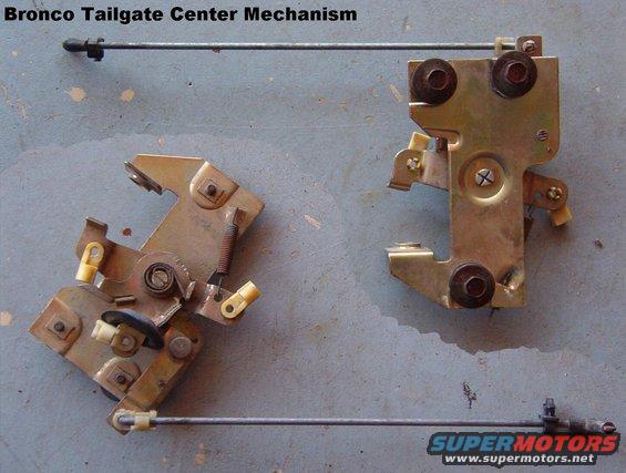 centermech.jpg Center mechanism front & back.  Ford calls it the &quot;remote control&quot;.

The rubber grommet for the handle operating rod is slid onto that lever just for storage.

The interlock rod (top & bottom) hangs under the glass.  The black retainer keeps it from rattling or swinging out-of-place.