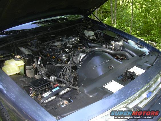 Blue 1996 Ford Crown Victoria engine bay with hood open
