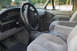1995 Ford Bronco - Interior view of a 1995 Ford Bronco, showing the dashboard, steering wheel, and front seats.