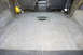 1995 Ford Bronco - The cargo area of a vehicle, showing the floor and rear seats.