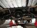 1962 Ford Thunderbird - The underside of a vehicle shows a freshly painted rear axle and suspension components, indicating ongoing restoration work.