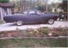 Dark pickup truck, side view. Not a 1973 Ford Ranchero