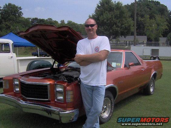 Copper 1978 Ford Ranchero with hood open, man standing beside it