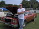 1979 Ford Ranchero - A man poses with a copper 1978 Ford Ranchero at an outdoor event.