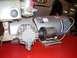 1992 Ford Bronco - Close-up view of an air compressor motor, showing its various components and wiring.