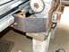 1979 Ford Bronco - A custom-fabricated winch bumper part is shown, supported by concrete blocks and wooden beams.